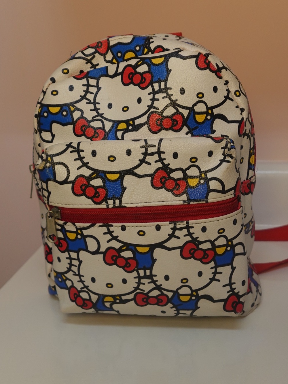 Hello Kitty White Backpack with Red Bows and Blue Outfits